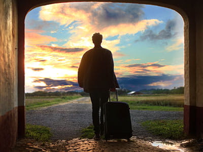 man holding luggage