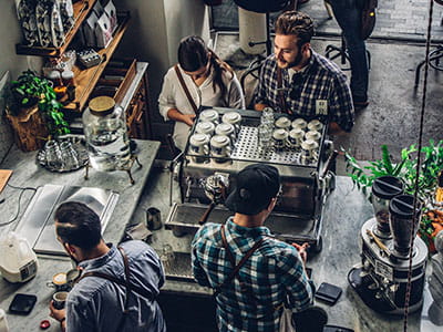 man buying coffee on counter